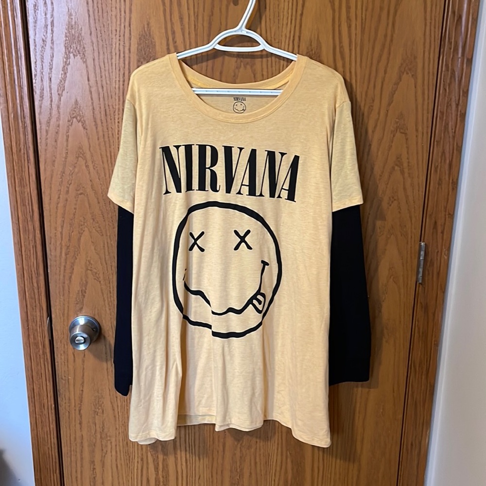 One piece, long sleeved Nirvana shirt.